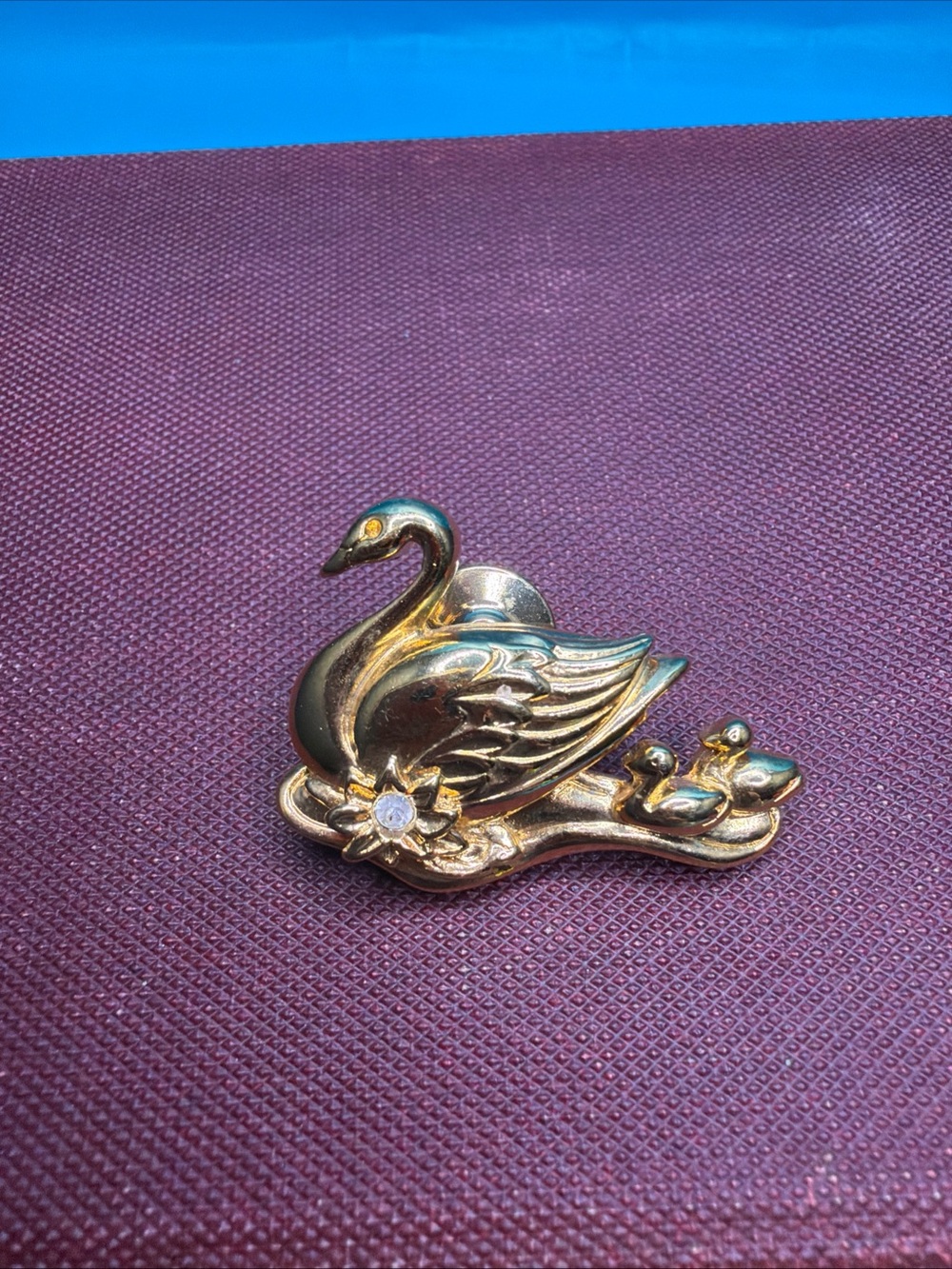 Avon Gold-Tone Swan Pin with Crystal Flower Accent
